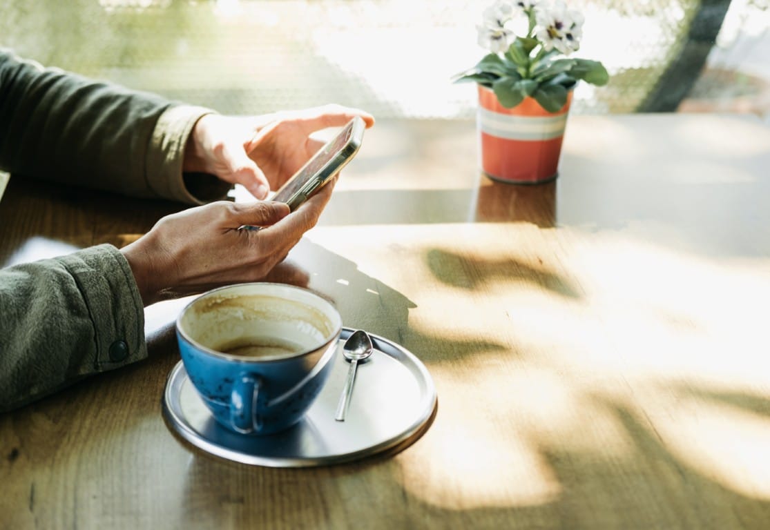 Patient searching for a local dentist on a smartphone before booking