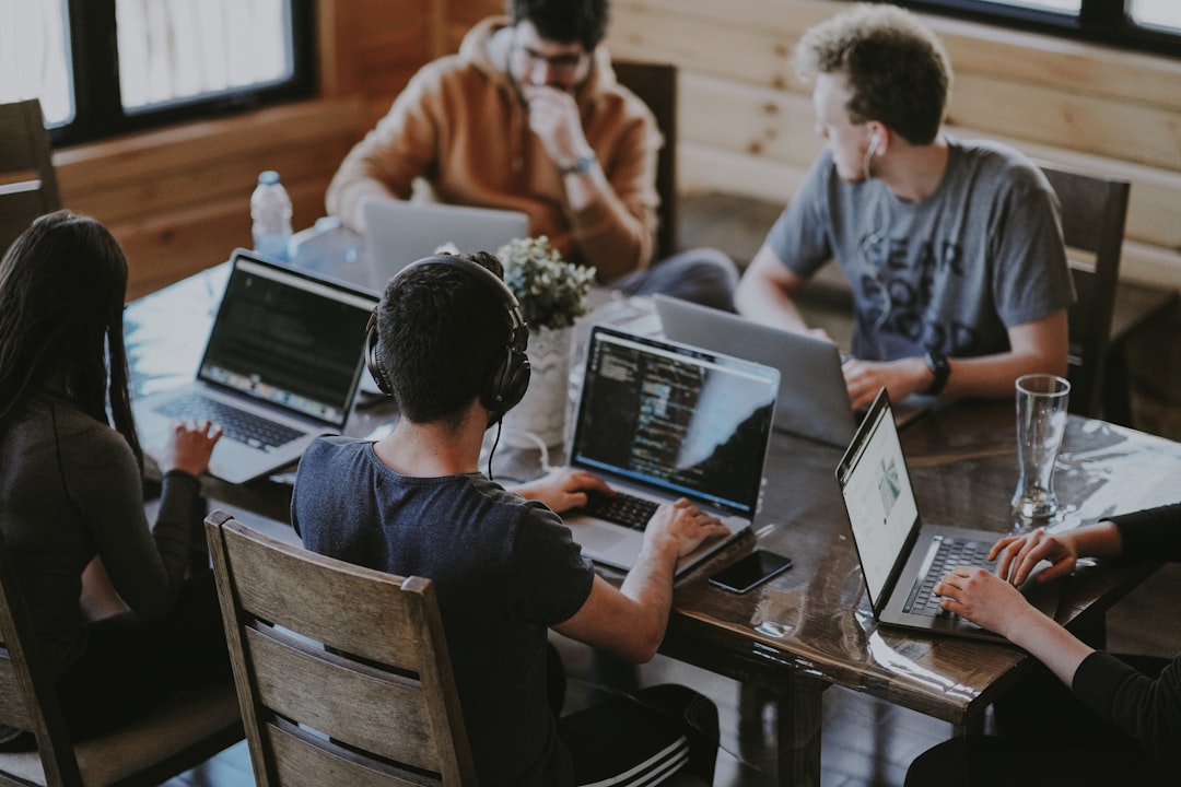 restaurant marketing agency — group of people using laptop computer