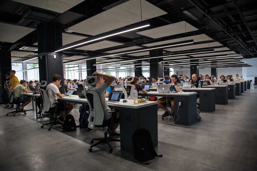 seo vs geo — people doing office works