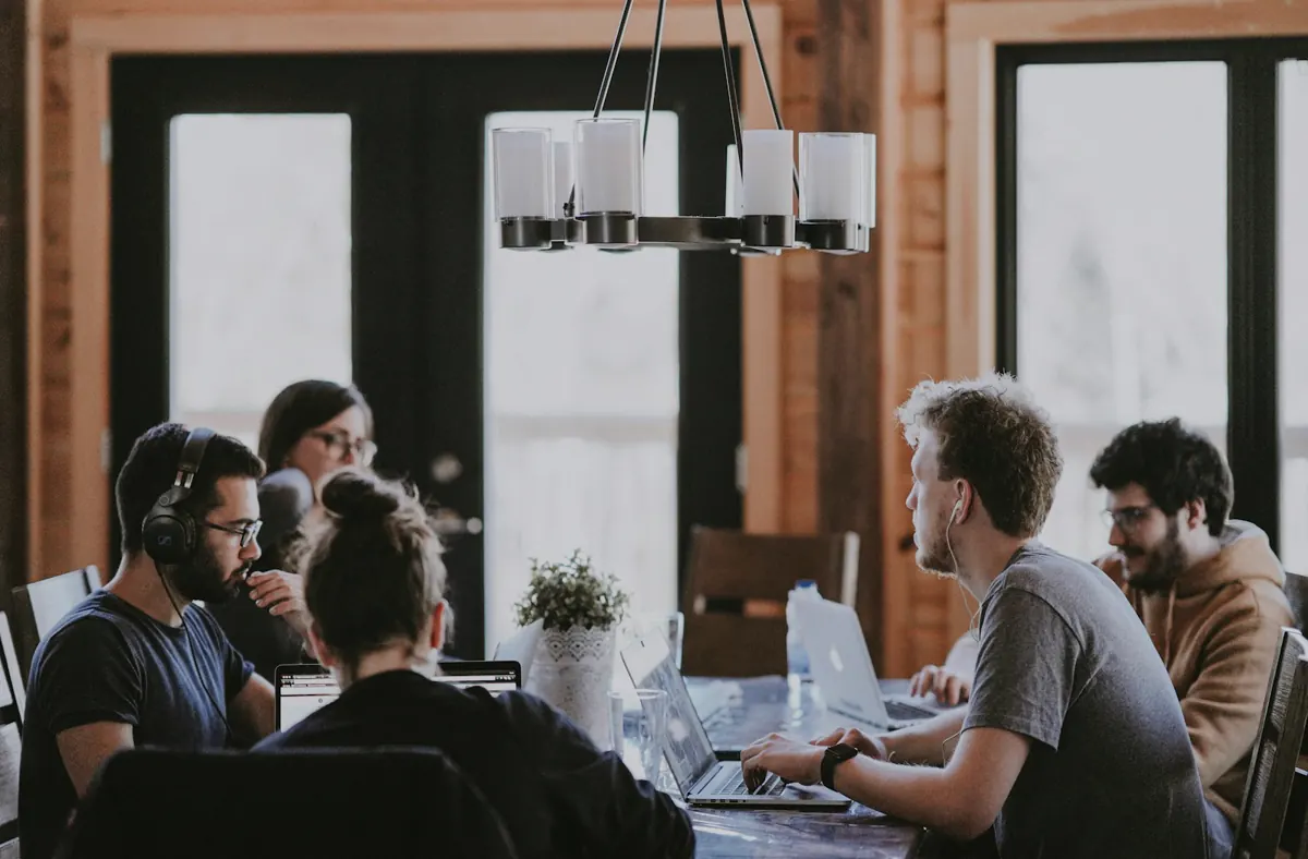 Business partners collaborating in a meeting for a referral program