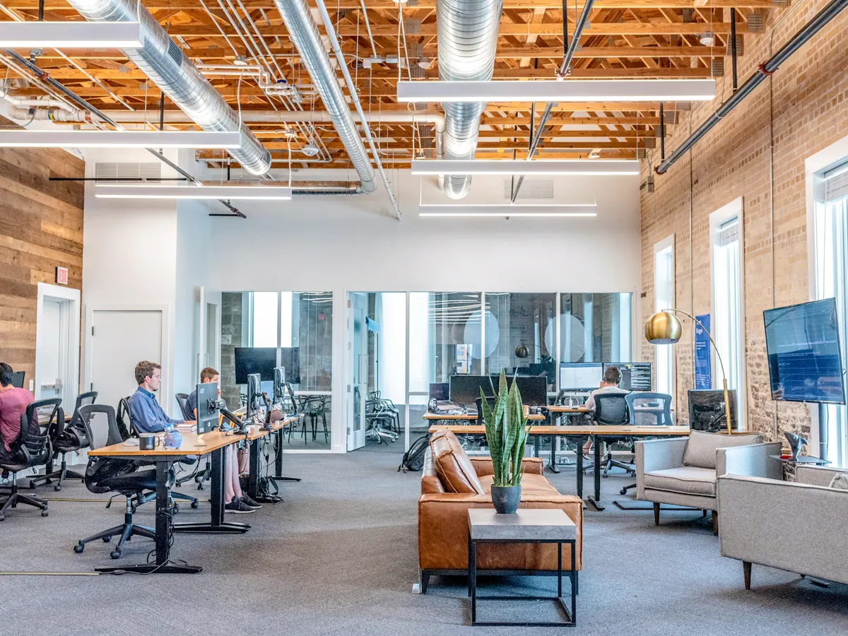 Marketing team planning digital advertising campaigns at a conference table